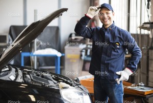 stock-photo-64373539-smiling-mechanic